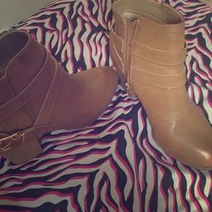 Light brown heels with golden zipper and buckle!